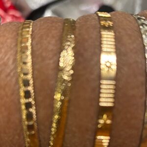 Elegant Gold Bangle Set of 4 (3 gold tone/1 silver) bundle
